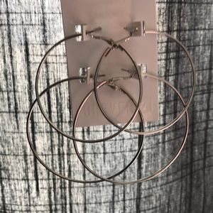 two forever 21 oversized silver hoops